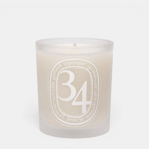 Shop Rescue Spa 34 Boulevard Saint Germain scented candle in a white opaline glass vessel with signature branding.