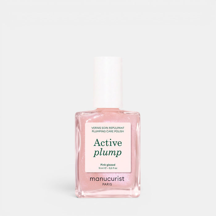 Shop Rescue Spa Active Plump collagen-infused nail polish in a pearly baby pink finish with a gel-like texture.