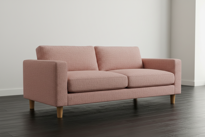 Akito Blush sofa on black wooden floor