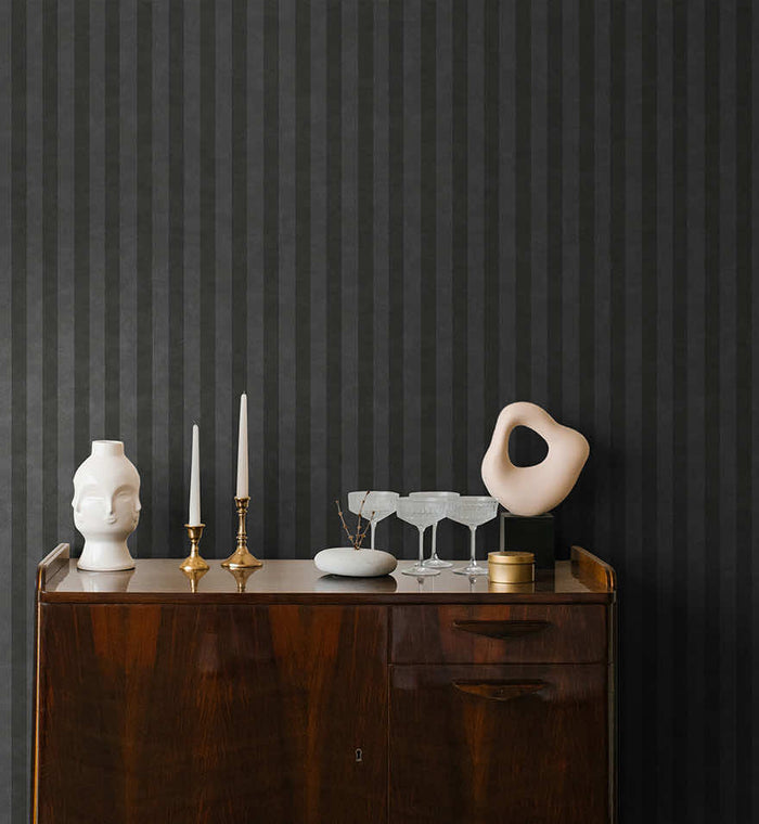 Aquila Stripes wallpaper in charcoal on a feature wall