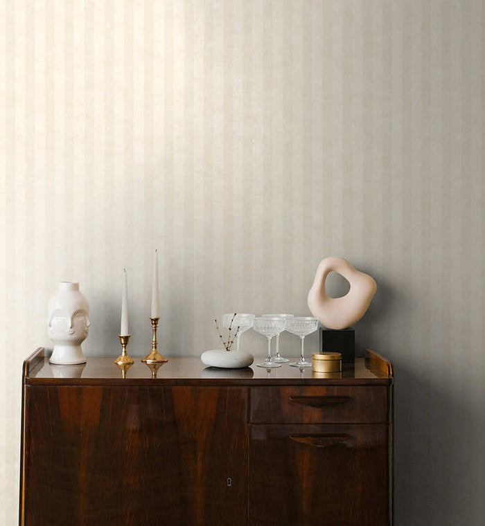 Aquila Stripes wallpaper in cream on a feature wall