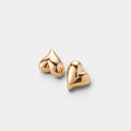 Shop Rescue Spa asymmetrical heart button earrings in high-polish 14k gold-dipped brass on a white background.