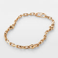 Shop Rescue Spa gold chain necklace featuring faceted links and voluminous heart charms with an exaggerated S-clasp.