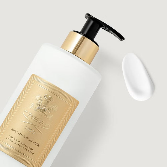 Shop Rescue Spa The House of Creed Aventus For Her hand and body lotion in a frosted bottle with a gold label.