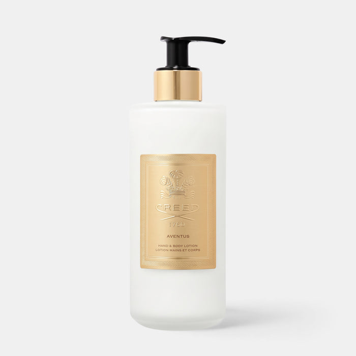 Shop Rescue Spa Aventus Hand & Body Lotion in a frosted glass bottle with a gold label and black pump dispenser.