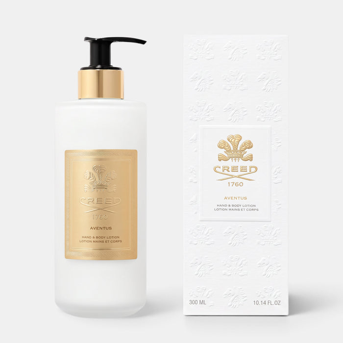 Shop Rescue Spa Aventus Hand & Body Lotion in a frosted glass bottle with gold label and matching white gift box.