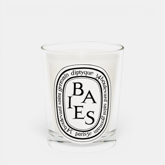 Shop Rescue Spa Baies scented candle in a clear glass jar with a white wax blend and iconic oval label