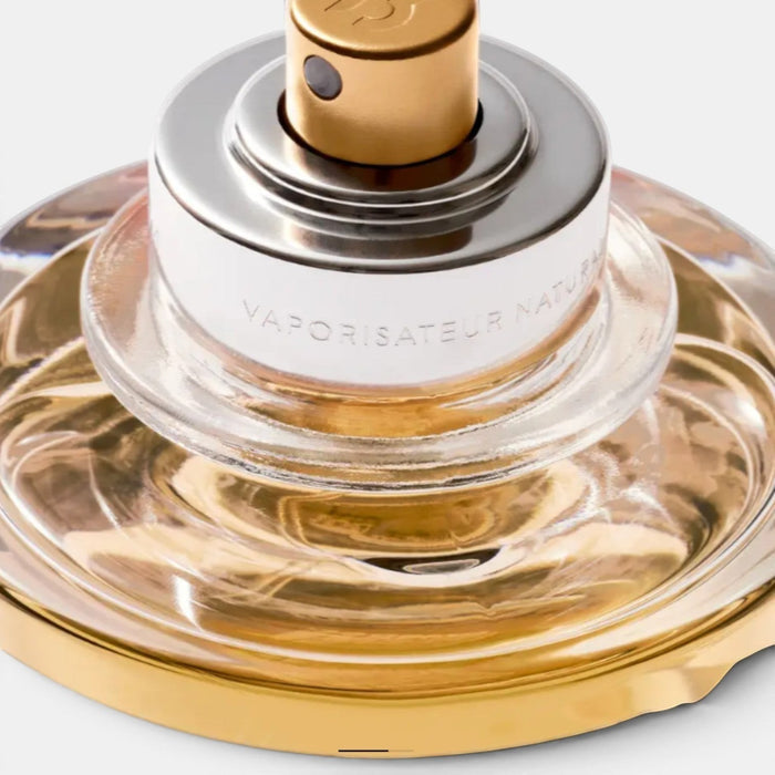 Shop Rescue Spa Bal d'Afrique Absolu De Parfum, a rich amber fragrance in a glass bottle with gold and silver accents.