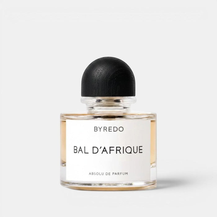 Shop Rescue Spa Byredo Bal d'Afrique Absolu de Parfum, a rich amber fragrance with a textured black wood cap.