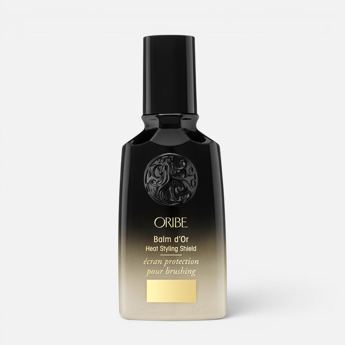 Shop Rescue Spa Oribe Balm d'Or heat styling shield bottle in black and gold gradient packaging.
