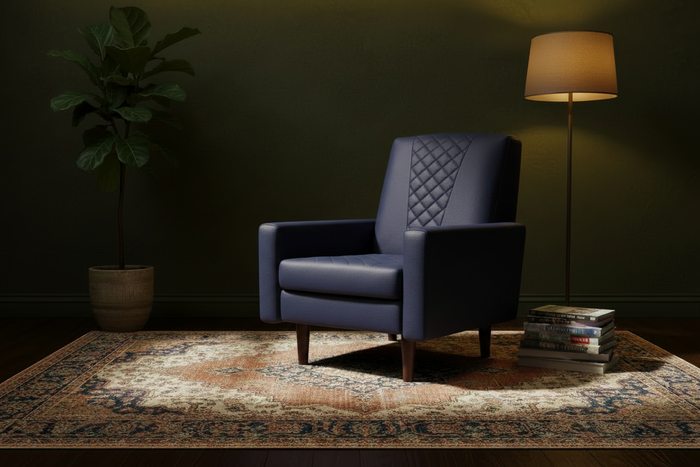 Fully upholstered navy armchair