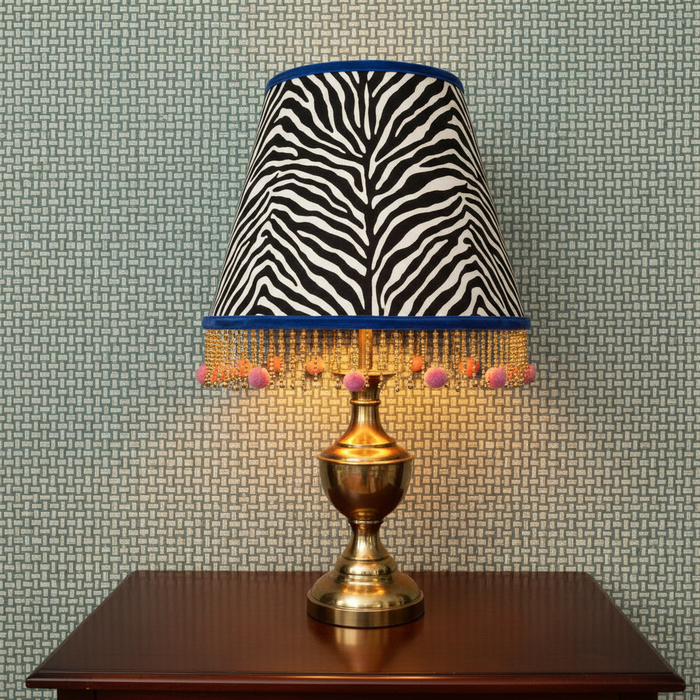 Zebra print lampshade with accurate Biderbost Weave teal wallpaper background