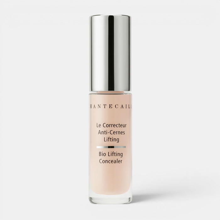 Shop Rescue Spa Bio Lifting Concealer in a light beige shade with a silver cap. Lightweight cream formula for brightening and coverage.