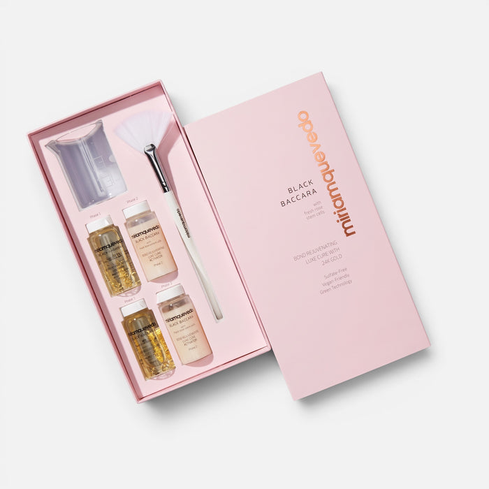 Shop Rescue Spa Black Baccara Bond Rejuvenating Luxe Cure hair treatment set with four vials, brush, and mixing cup.