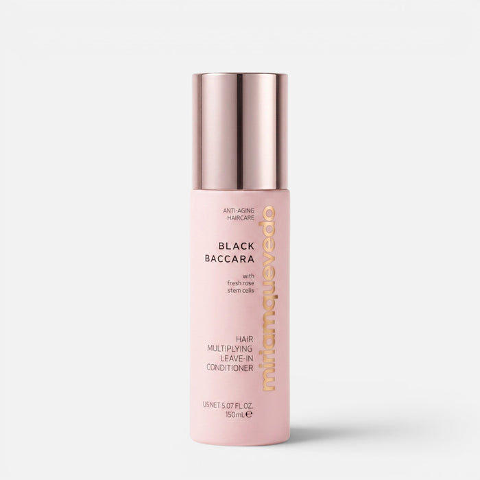 Shop Rescue Spa Black Baccara Hair Multiplying Leave-In Conditioner in a pale pink bottle with a metallic cap.