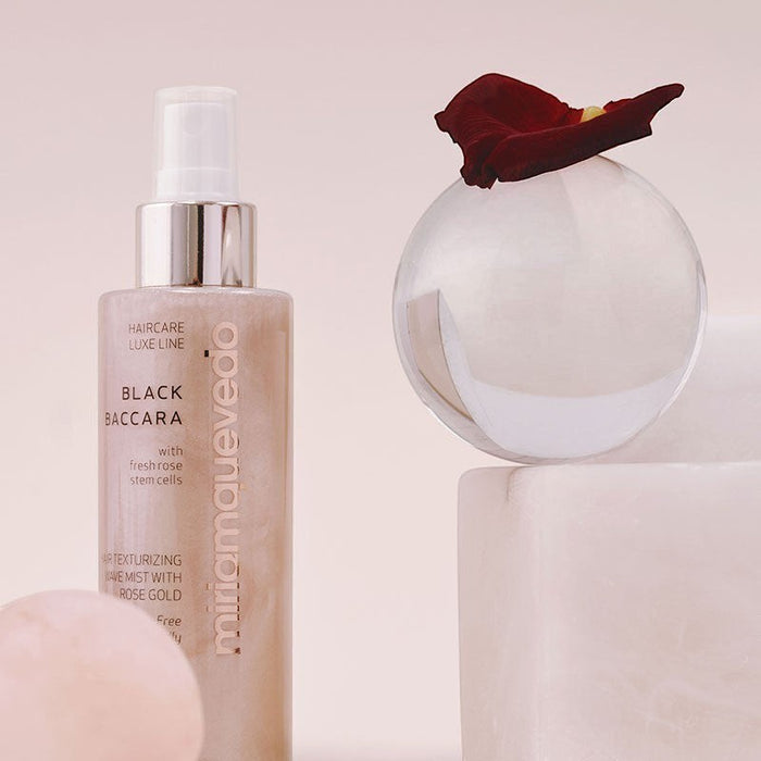 Shop Rescue Spa Miriam Quevedo Black Baccara hair texturizing wave mist bottle with rose gold shimmer and rose petal