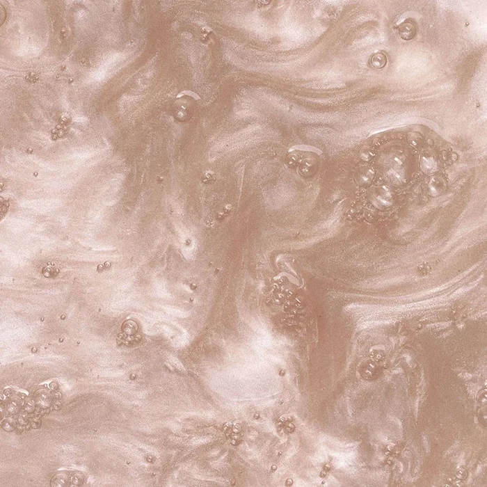 Shop Rescue Spa Black Baccara Hair Texturizing Wave Mist featuring a shimmering rose gold liquid texture with bubbles