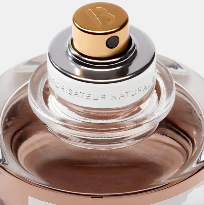 Shop Rescue Spa Black Saffron Absolu de Parfum 50ml bottle with gold and silver cap. Notes of saffron, leather, and woods.