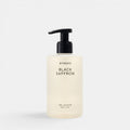Byredo Black Saffron body wash in a clear pump bottle with black dispenser