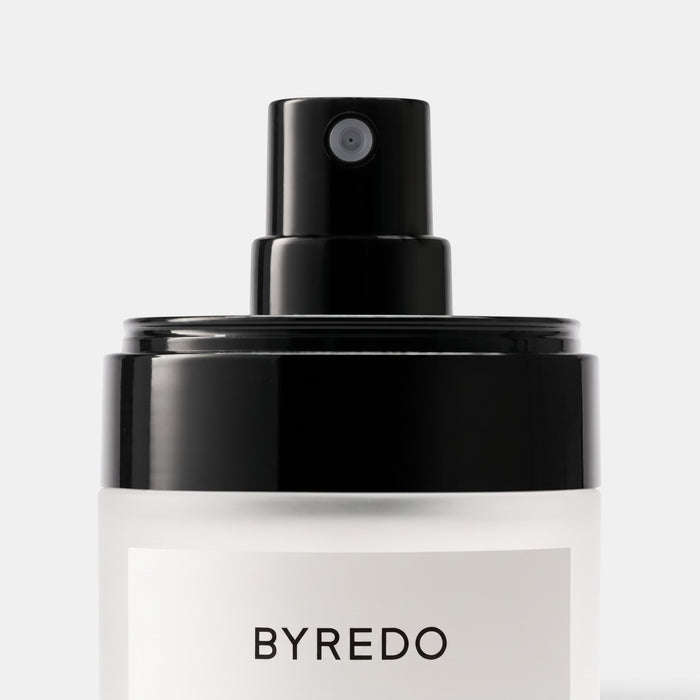 Shop Rescue Spa Byredo Rose Of No Man's Land body mist bottle with a black cloud-effect spray pump