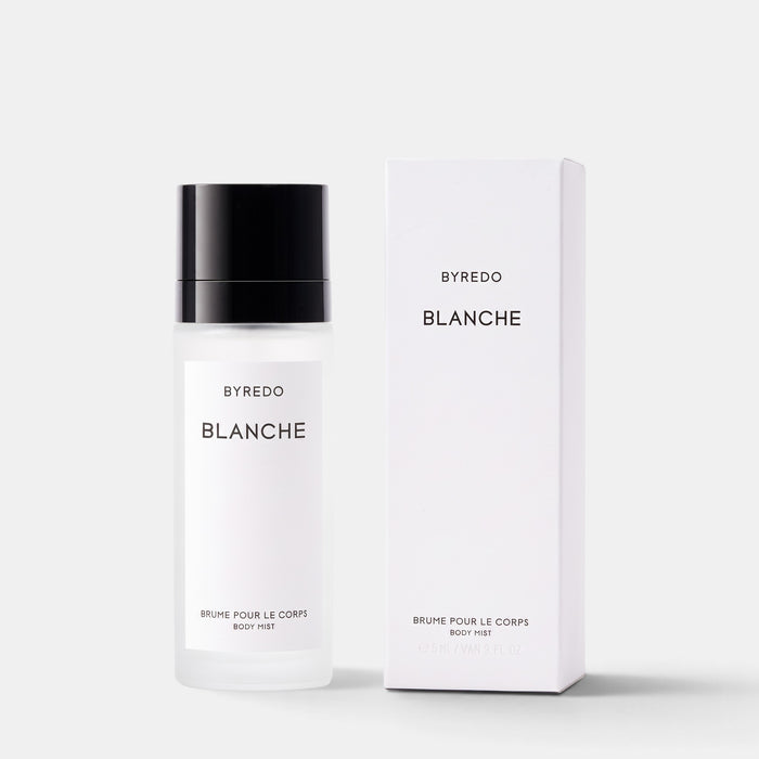 Shop Rescue Spa Byredo Blanche body mist in a frosted glass bottle with a black cap next to its white box packaging.