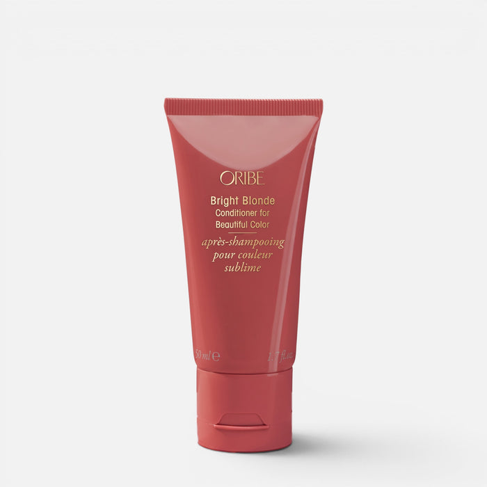 Shop Rescue Spa Oribe Bright Blonde Conditioner in a rose-colored squeeze tube for neutralizing brassy hair tones.