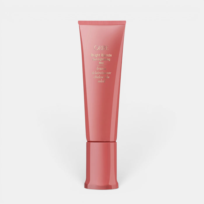 Shop Rescue Spa Oribe Bright Blonde Sun Lightening Mist in a pink squeeze tube for illuminating hair highlights.