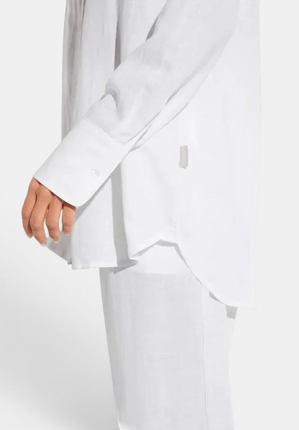 Side view of Zimmerli Button Front Shirt Long Sleeve in white worn on model, showing fit, sleeve length, and shirt drape from profile angle.