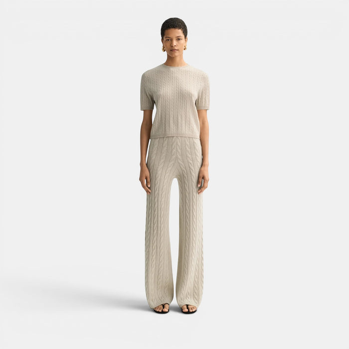 Shop Rescue Spa beige 100% cashmere fitted cable knit short sleeve top.