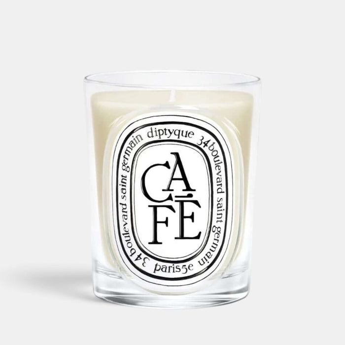 Shop Rescue Spa Cafe scented candle in a clear glass vessel with coffee and woody fragrance notes