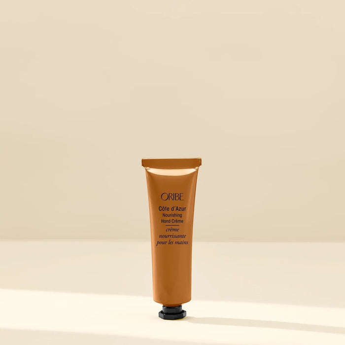 Shop Rescue Spa ORIBE Cote d'Azur Nourishing Hand Creme tube, a rich moisturizing blend for dry skin.