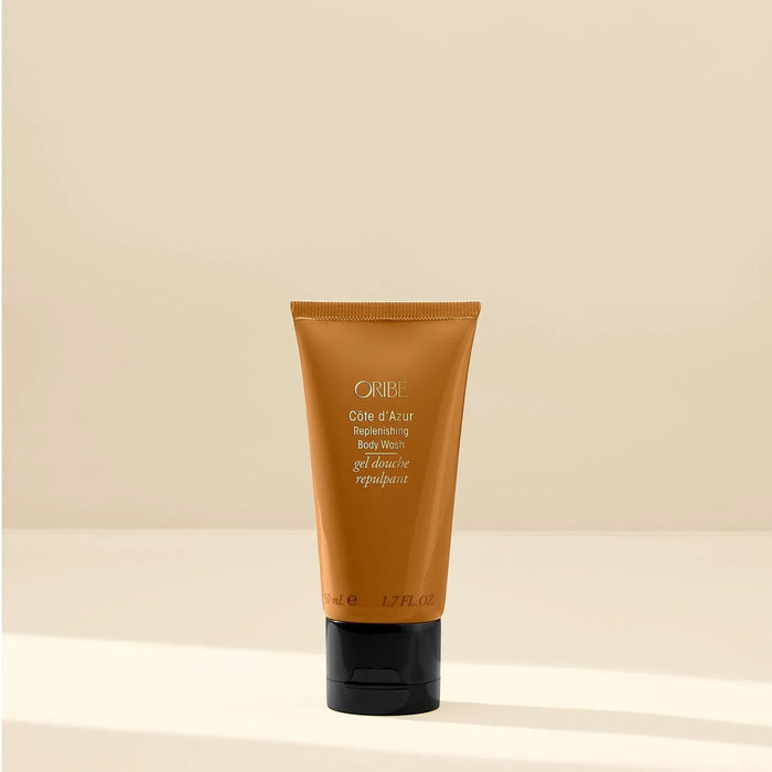Shop Rescue Spa Oribe Cote d'Azur Replenishing Body Wash tube with black cap. 50ml/1.7 fl oz.
