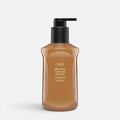 Shop Rescue Spa Oribe Cote d'Azur Replenishing Body Wash in a brown pump bottle for skin hydration and brightening.