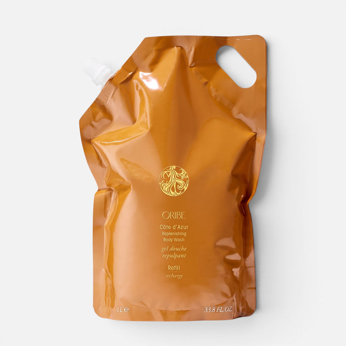 Shop Rescue Spa Oribe Cote d'azur Replenishing Body Wash 1L refill pouch in metallic gold packaging.