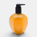 Shop Rescue Spa Oribe Cote d'Azur revitalizing hand wash in an amber bottle with a black pump dispenser.