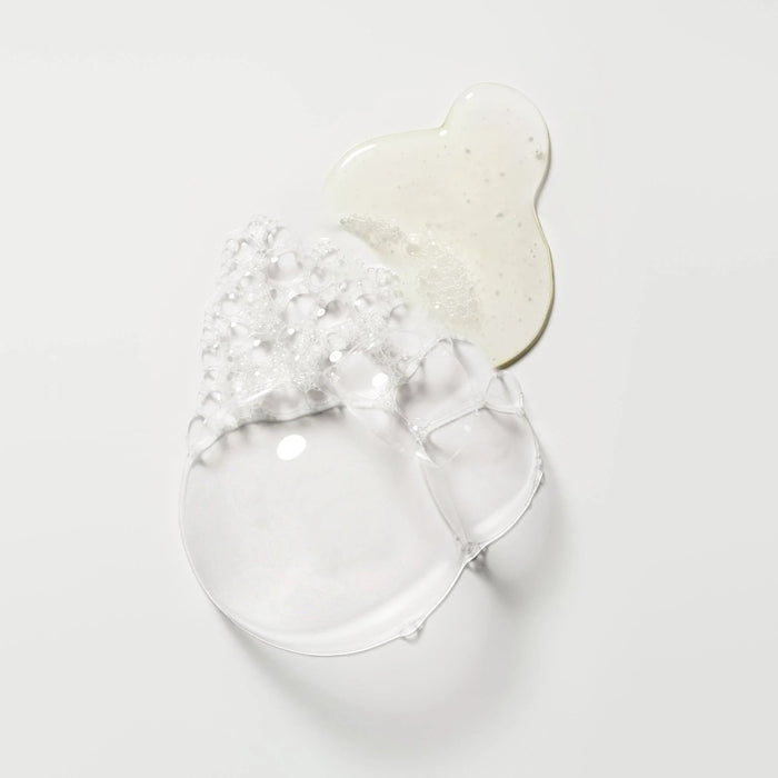 Shop Rescue Spa Cote d'Azur Revitalizing Hand Wash with lather and clear gel on white background.