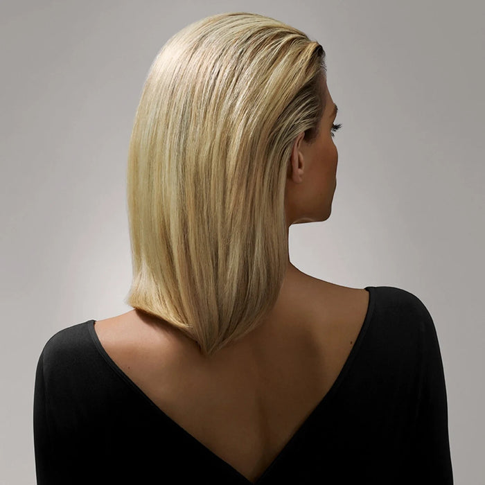 Shop Rescue Spa Creme for Style used on a woman with sleek, shiny blonde hair for a firm, flexible hold.