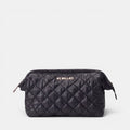 Shop Rescue Spa Crosby Frame cosmetic bag in black quilted REC Oxford fabric with silver hardware and leather trim.