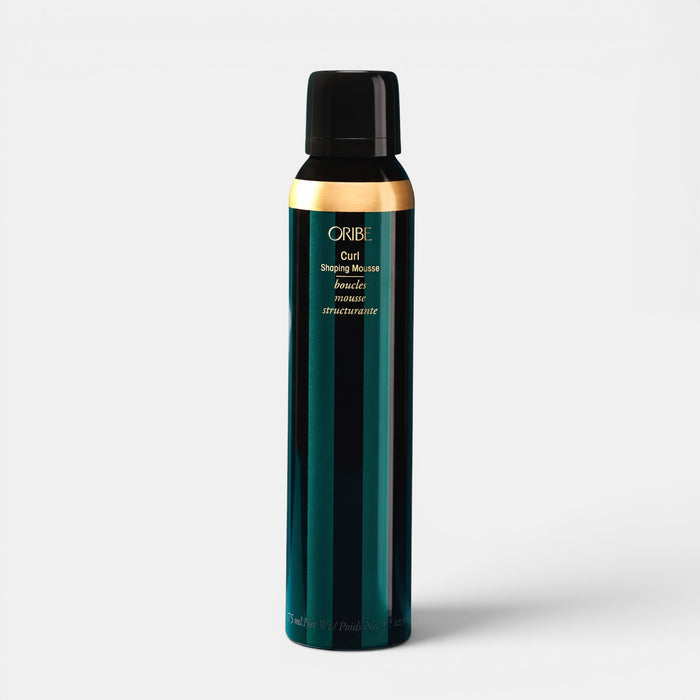 Shop Rescue Spa Oribe Curl Shaping Mousse in a dark green cylindrical bottle for defining and hydrating curls.