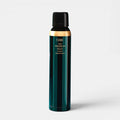 Shop Rescue Spa Oribe Curl Shaping Mousse in a dark green cylindrical bottle for defining and hydrating curls.