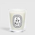 Shop Rescue Spa Cypres candle in a clear glass jar with a white wax finish and signature oval label
