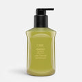 Shop Rescue Spa Oribe Desertland Restorative Body Creme in a 300ml olive green pump bottle for hydrating skin.