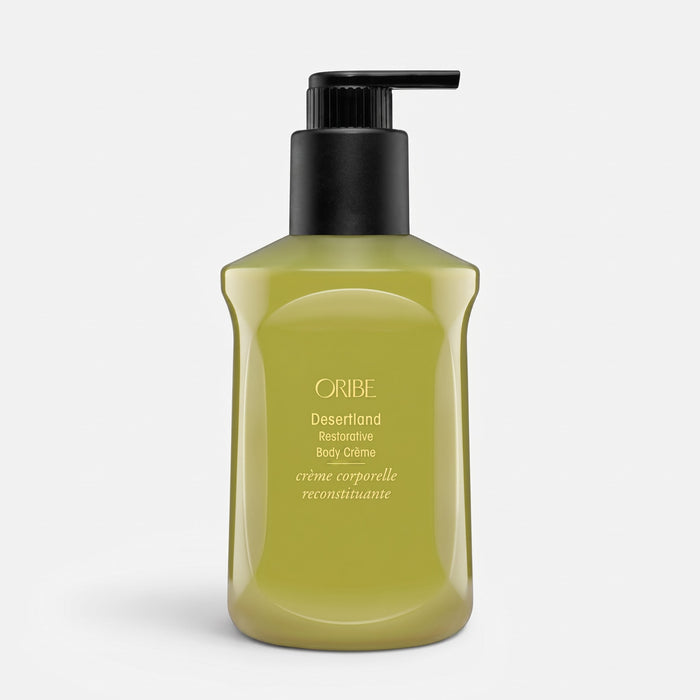 Shop Rescue Spa Oribe Desertland Restorative Body Creme in a 300ml olive green pump bottle for hydrating skin.