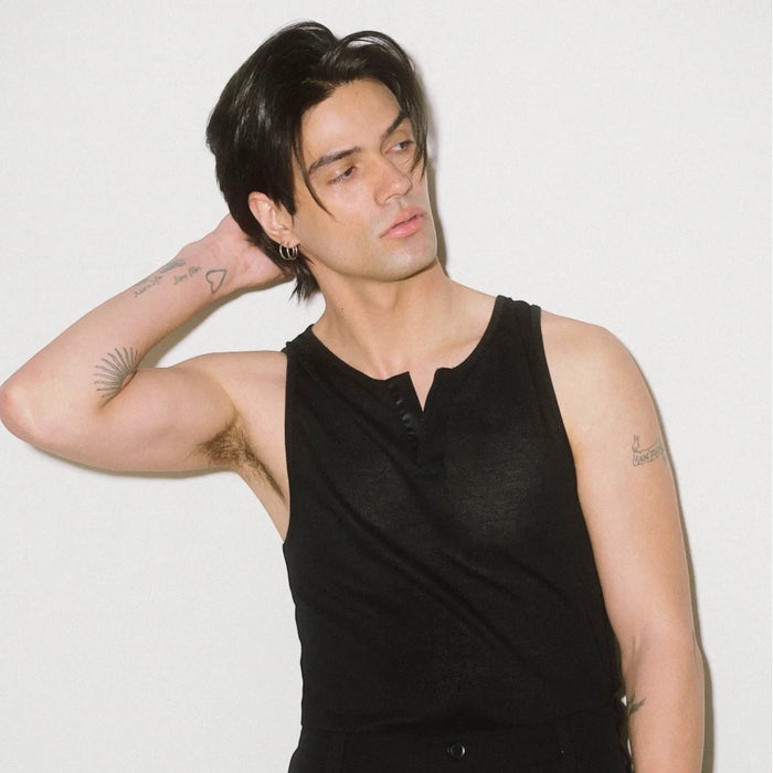 Shop Rescue Spa model with styled hair using volumizing dry texturizing spray for texture and lift