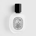 Shop Rescue Spa Eau Rose hair mist in a frosted glass bottle with a black cap, featuring Damascena and Centifolia rose.
