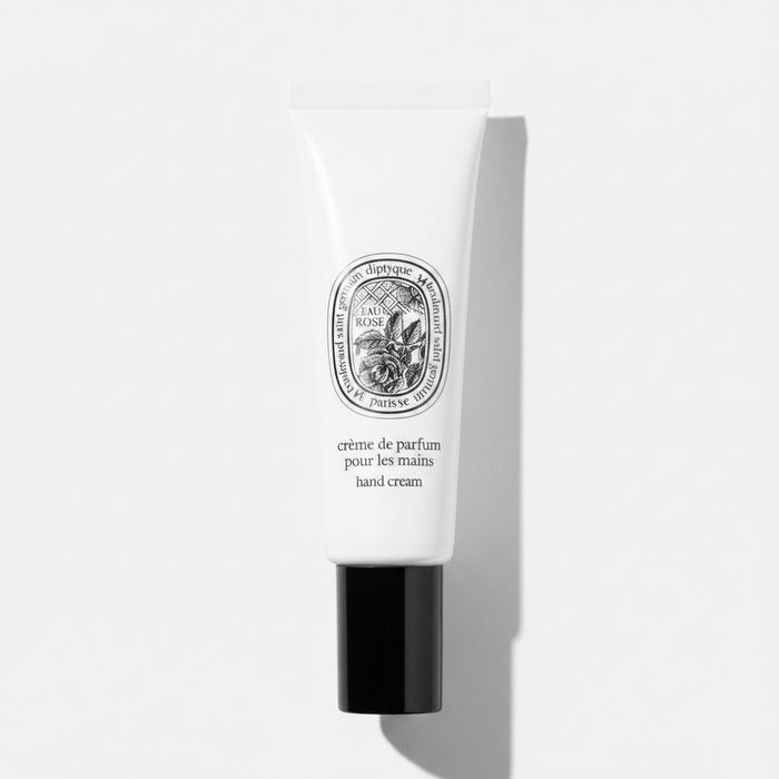 Shop Rescue Spa Eau Rose hand cream in a white 45ml tube with a black cap, featuring a floral rose label design.