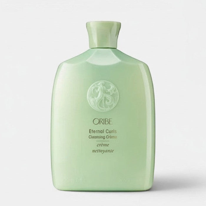 Shop Rescue Spa Oribe Eternal Curls Cleansing Creme in a light green bottle for curly and coily hair.