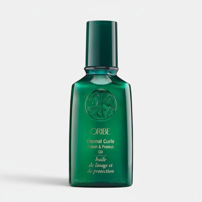 Shop Rescue Spa Oribe Eternal Curls Polish & Protect Oil in a dark green glass bottle for curly hair care.
