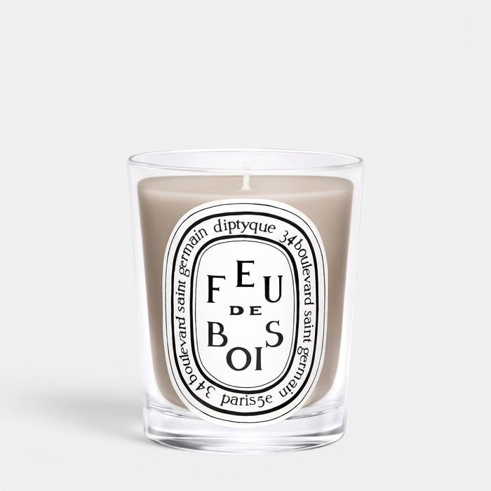 Shop Rescue Spa Feu De Bois scented candle in a clear glass jar with a smoky wood fragrance and iconic label