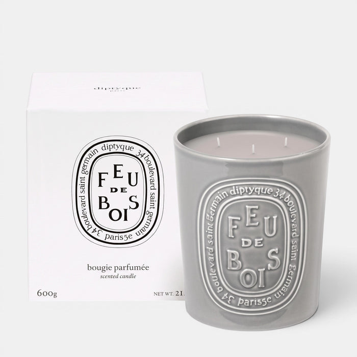 Shop Rescue Spa Feu De Bois scented candle in a grey ceramic vessel with matching white gift box